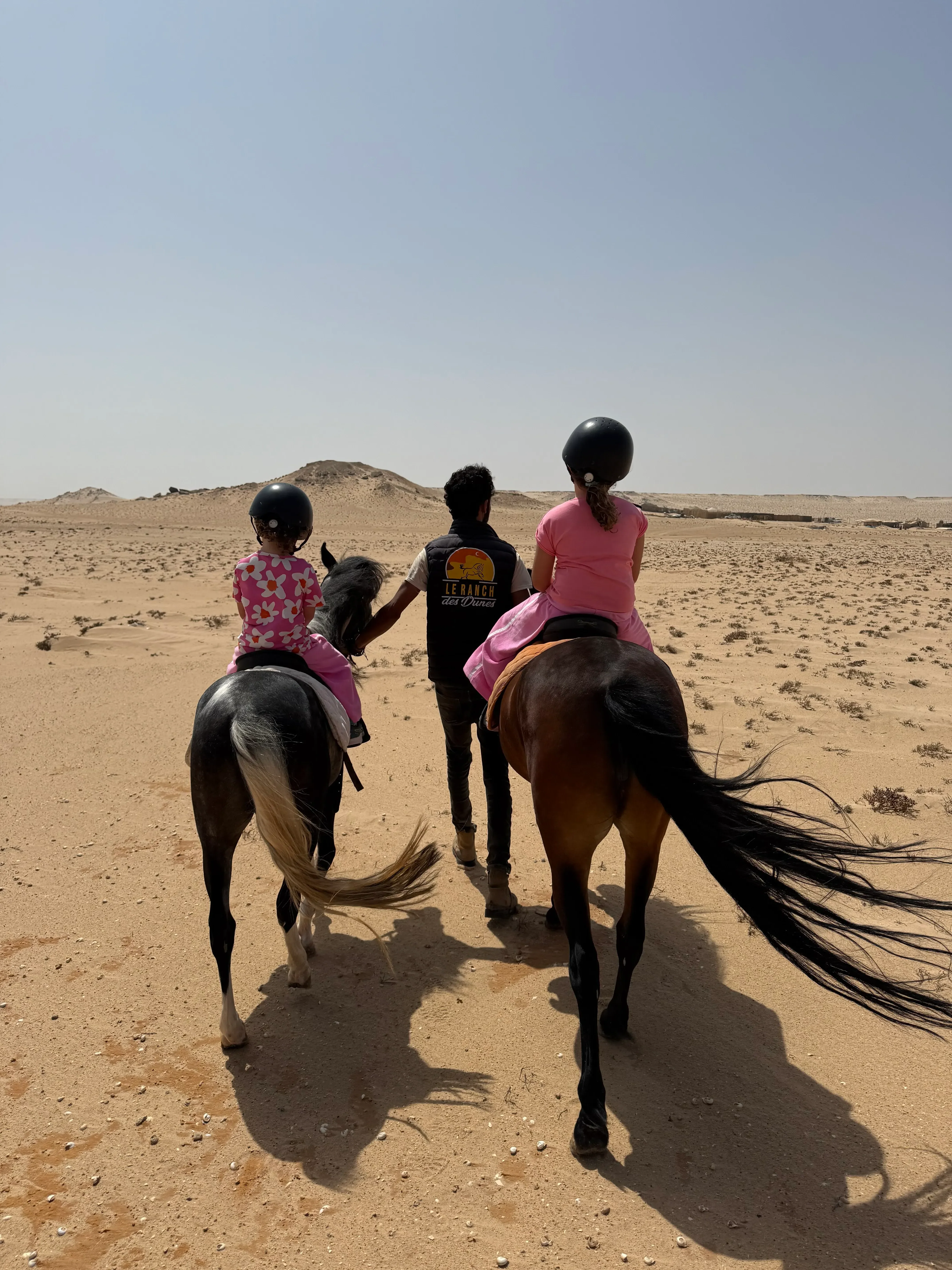 Child on a pony in the Dakhla desert